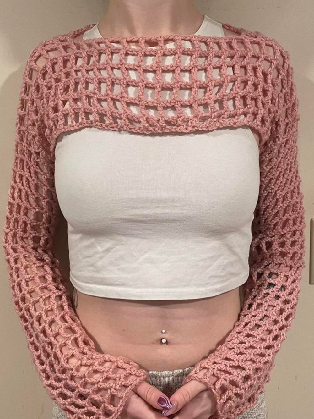 Pink crochet long-sleeve shrug